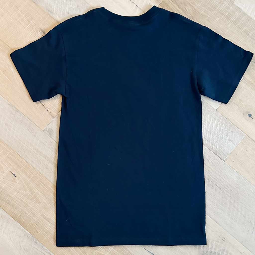 Navy back of t-shirt on wood background