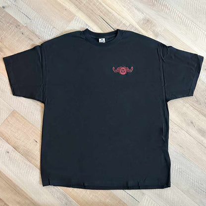 Front of black shirt with red Chris Kyle Frog foundation logo with American Flag Wings