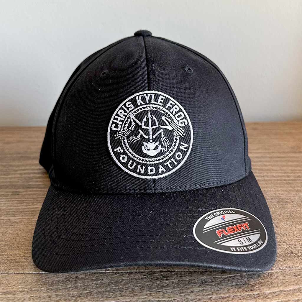 Black hat with white embroidered Chris Kyle Frog Foundation circle logo