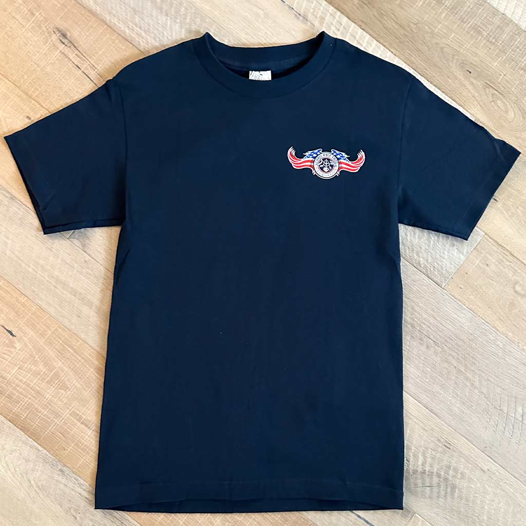 Red, white and blue Chris Kyle foundation circle logo with American flag wings on a Navy shirt