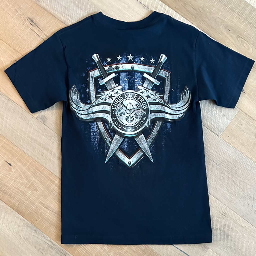 Navy Shirt with a shield and two swords crossing with Chris Kyle Frog Foundation logo on top