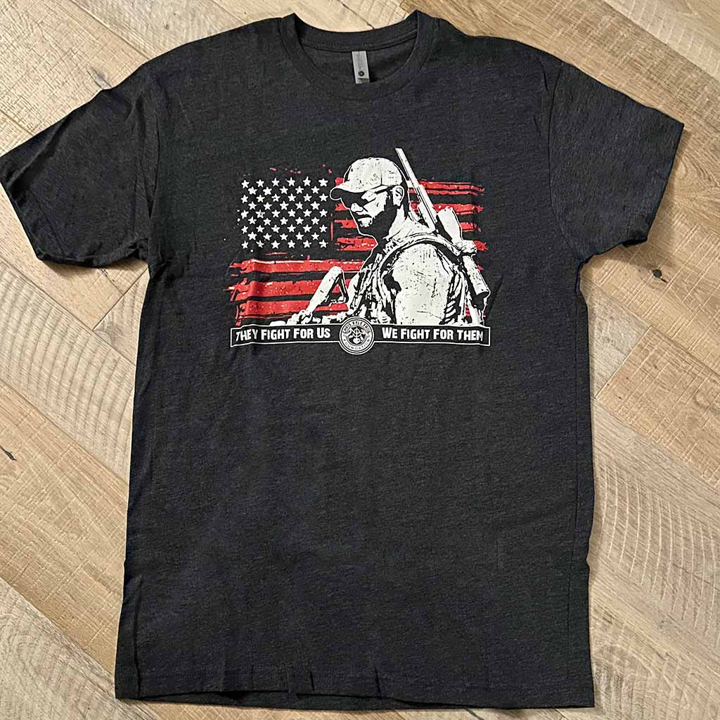 Dark Grey Shirt with a white Chris Kyle's Silhouette on a red American Flag background