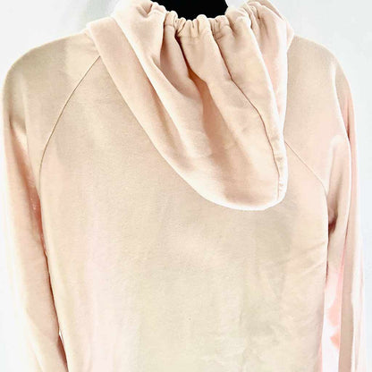 back side of a light pink hoodie