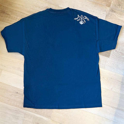 Back of navy blue shirt with bone frog graphic on shoulder