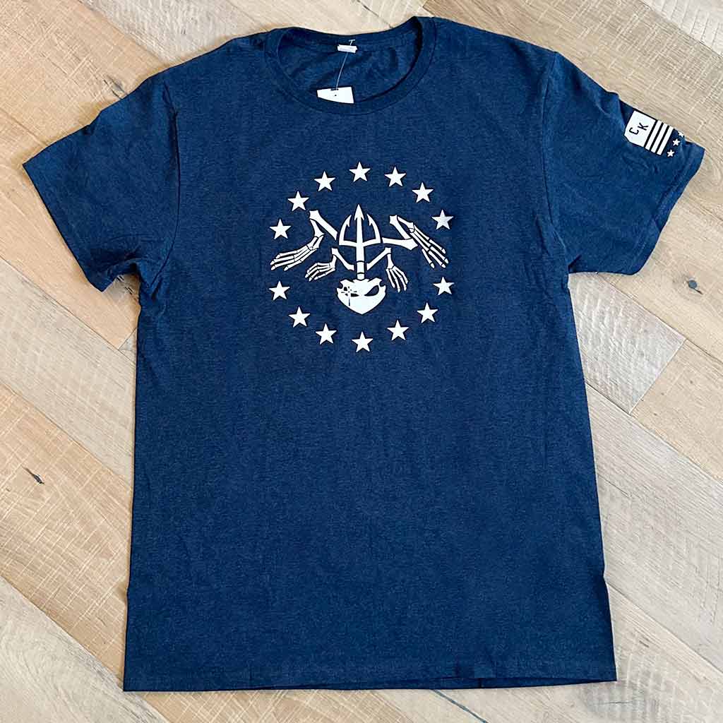 Front of navy shirt with Chris Kyle's bone frog surrounded by stars in white