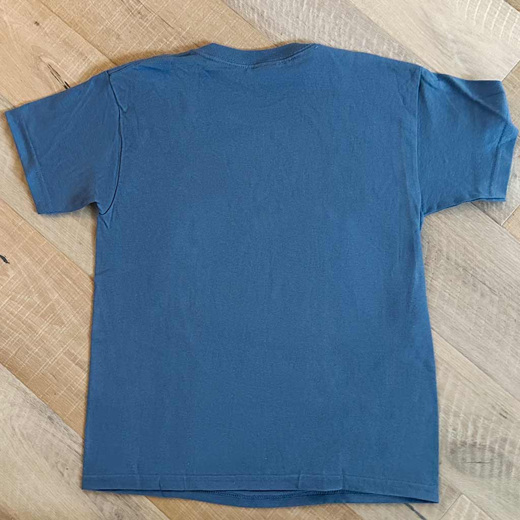 Back of blue shirt on wood background