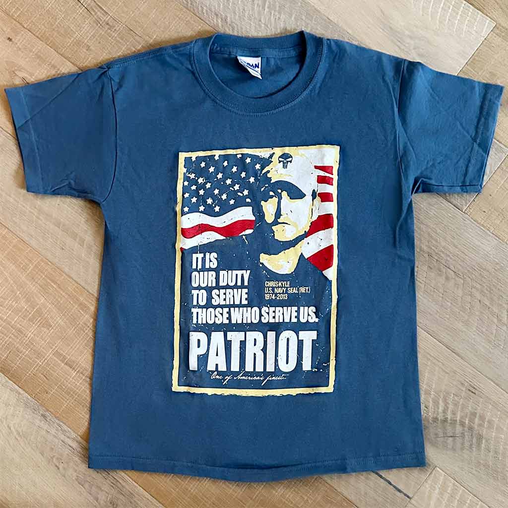 Blue shirt with Chris Kyle's silhouette with an American Flag background