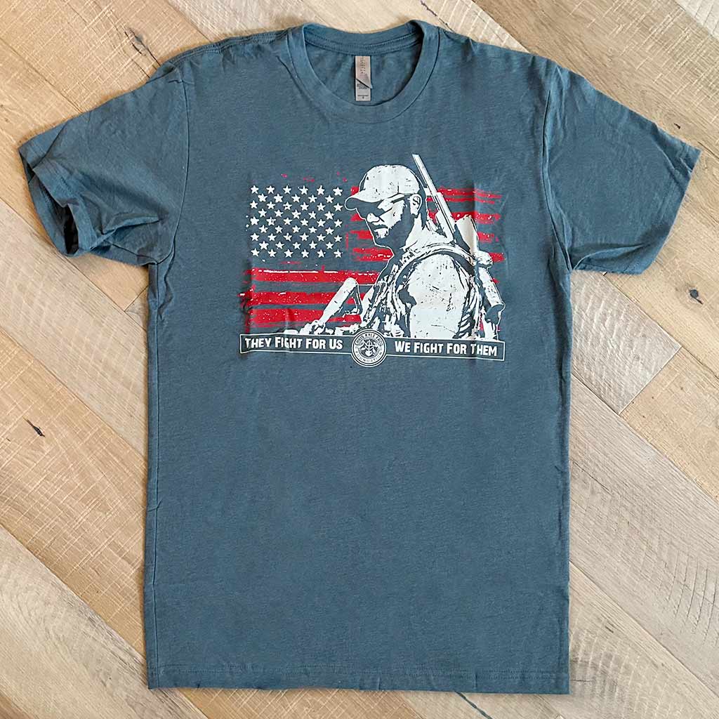 Grey Blue Shirt with Chris Kyle's face on top of an American Flag